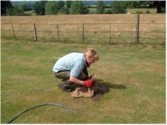 Ready with a sack to catch Moley - but note the very thick gauntlets